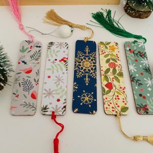 five Christmas themed bookmarks with colourful tassels