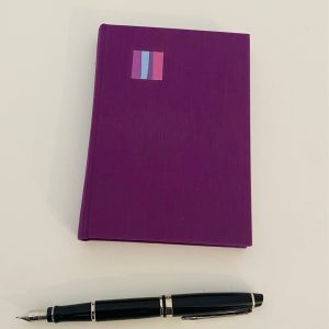 small purple cloth journal