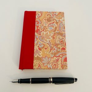 small red paisley journal