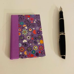 small notebook purple ditsy flowers