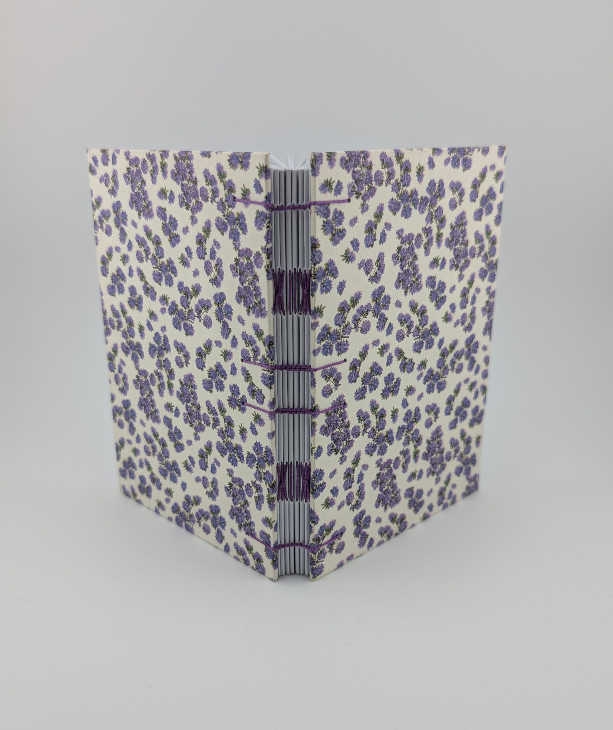 Purple tiny flowers Coptic journal